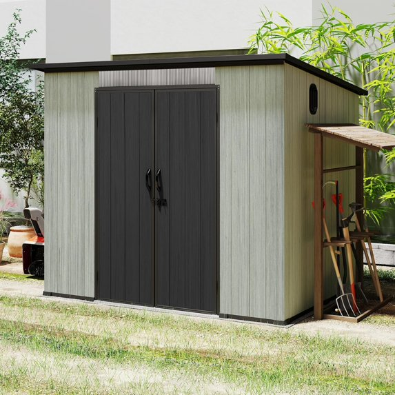 Louvered resin shed with attached tool store